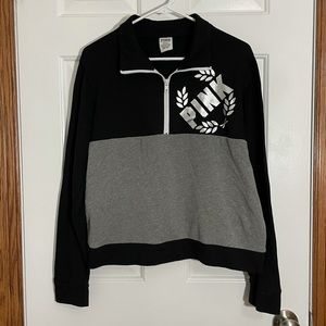 Pink quarter-zip. Size Medium. Black and silver